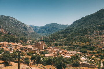 Fototapeta na wymiar A panoramic view of Valldemossa, a very popular tourist destination in the Balearic Islands of Spain