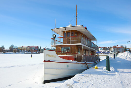SAVONLINNA, FINLAND - MARCH 03, 2018: "Punkaharju" - the old passenger steamship winters at the city embankment