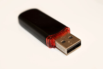 Black usb flash drive close up on white background. Usb drive isolated