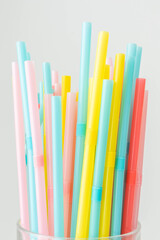 Colourful straws arranged in a vibrant display. 