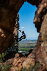 Rock climber on a face of a cliff face