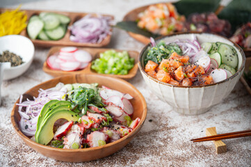 assorted pokes and poke bowls