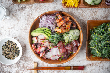 deluxe poke bowl with tuna, octopus and salmon