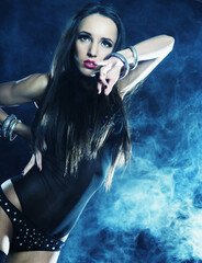 Fashion shoot of young sexy striptease dancer