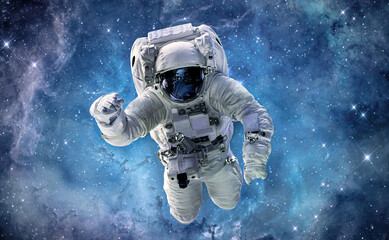 Fototapeta na wymiar Astronaut in bright galaxy. Universe and spaceman. Outer space. Elements of this image furnished by NASA