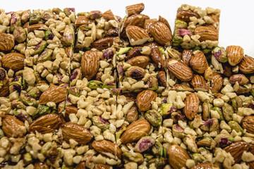 Plate with type of Arabic sweets in sweet shop in Lebanon