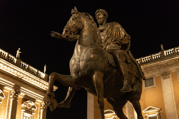 Statue on horseback of the Roman Emperor Marcus Aurelius, in bronze located at the Piazza del Campidoglio seat of the Municipality of Rome made by Michelangelo, Italy. The photo was taken at night.