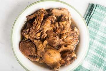 Filipino-Style Chicken Adobo Dish In Serving Bowl
