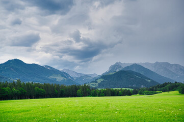 thunder clouds over the Austrian Chiemgau Alps