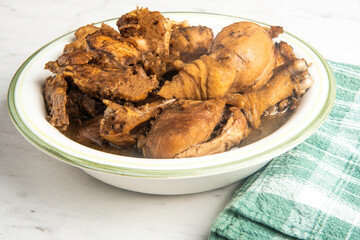 Filipino-Style Chicken Adobo Dish In Serving Bowl
