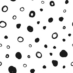 Doodle circles seamless pattern. Black dots texture background.
