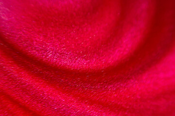 Red pearl paint, close-up. Macro photo background.