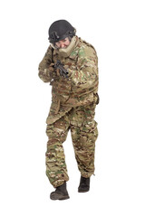 military commando in uniform with a shotgun attacks and aims on a white background, soldier in action