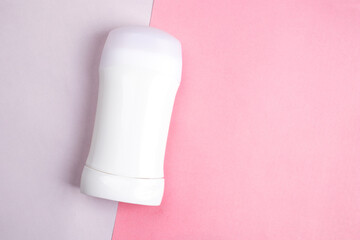 Cosmetic tube mock up isolated on pink background. Lotion skin care bottle template. Beauty concept.