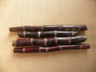Reddish brown color raw ripe Sugarcane stalks