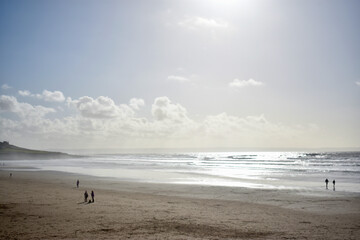 Bright sun shining on a UK beach