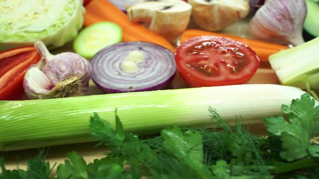 Multicolored colorful set of slices of vegetables, Healthy fresh rainbow colored vegetables in a row