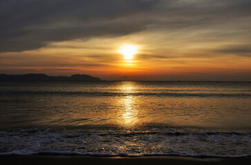 Fototapeta premium Sunset background on the sea coast