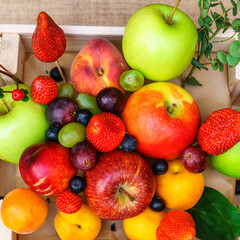 Close-up view of large collection fresh fruits useful for health. Harvesting concept. Fresh background.