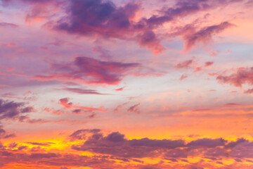 Beautiful sky at sunset in the evening. Rich colors, clouds.