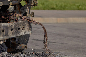 city burned cars after a fire in one of the city's districts