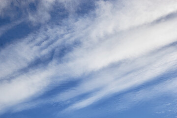 Blue sky background with white high clouds Altostratus, Cirrocumulus, Cirrus.