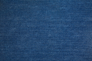 Texture of dark grated denim as background. Close-up