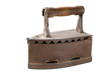 close-up of antique charcoal iron. White background.