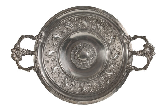 Antique silver-plated dish with handles, isolated on white background.
