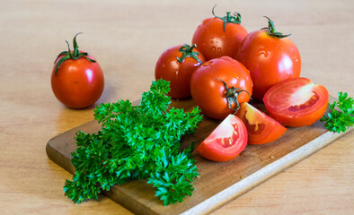 tomatoes with parsley on the plank