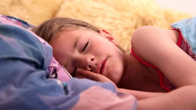 Young Girl Wakes Up In Bed