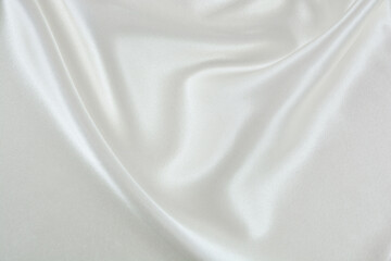 Fototapeta na wymiar Satin fabric with gentle curves