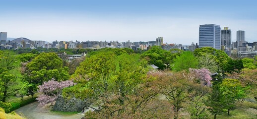 Fototapeta na wymiar View of Fukuoka skyline from the ruins of Maizuru castle. Fukuoka city, Japan. 04-07-2015