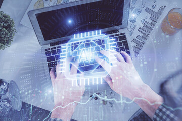 Double exposure of man's hands typing over computer keyboard and data theme hologram drawing. Top view. Technology concept.