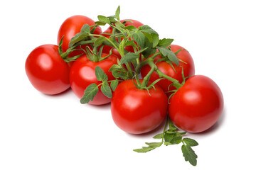 Ripe tomatoes with branches and leaves isolated on white background close-up