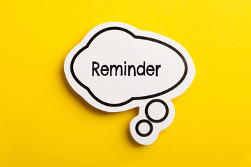 Reminder Speech Bubble Isolated On Yellow Background