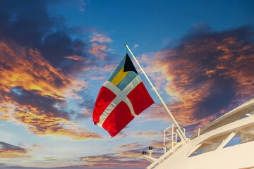Fototapeta premium The Flag of Bahamas Registry flying on a cruise ship