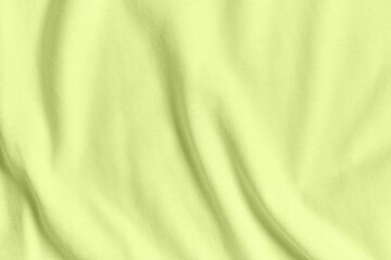 Texture and background of crumpled light green color fabric