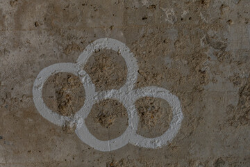 Closeup of bullet holes in concrete