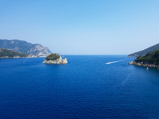 Obraz premium mountains by the sea, mountain ranges and rocks, seascapes, blue sky