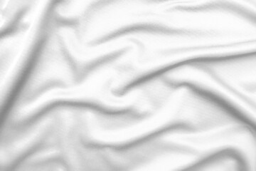 Abstract white fabric texture background. Wavy white cloth.