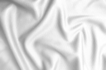 Abstract white fabric texture background. Wavy white cloth.