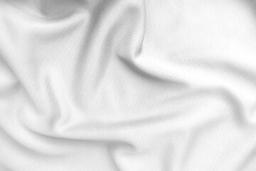 Abstract white fabric texture background. Wavy white cloth.