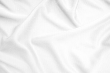 Abstract white fabric texture background. Wavy white cloth.