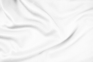 Abstract white fabric texture background. Wavy white cloth.