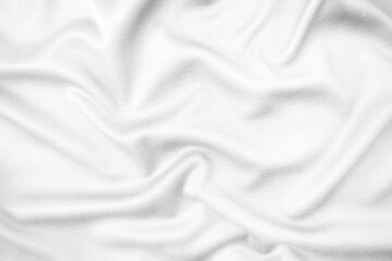 Abstract white fabric texture background. Wavy white cloth.