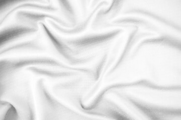 Abstract white fabric texture background. Wavy white cloth.