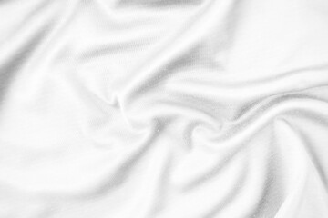 Abstract white fabric texture background. Wavy white cloth.