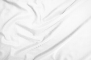 Abstract white fabric texture background. Wavy white cloth.