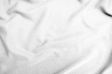Fototapeta premium Abstract white fabric texture background. Wavy white cloth.
